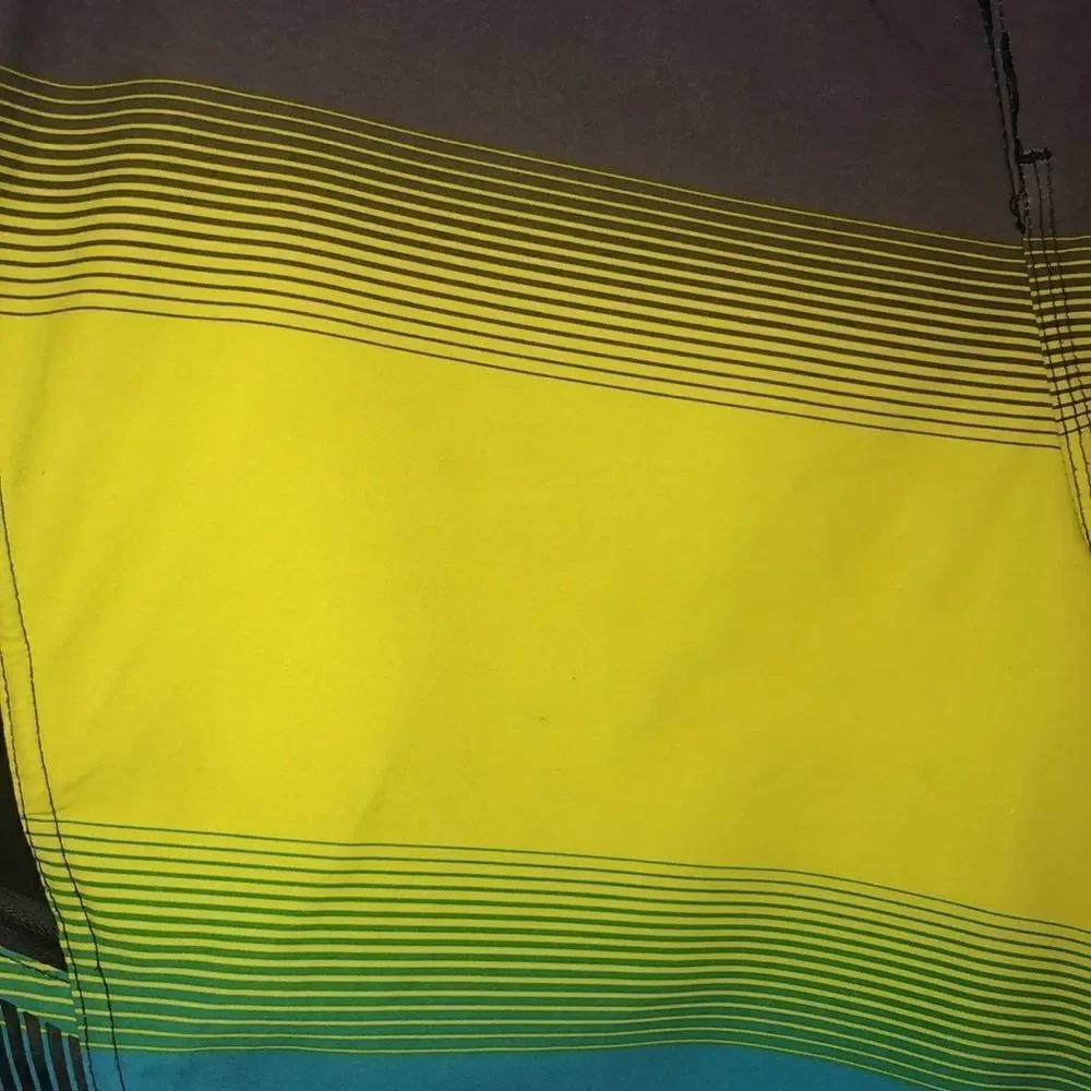 Billabong L ZeroGravityPlatinum Stretch Board Shorts Blue Yellow Gray